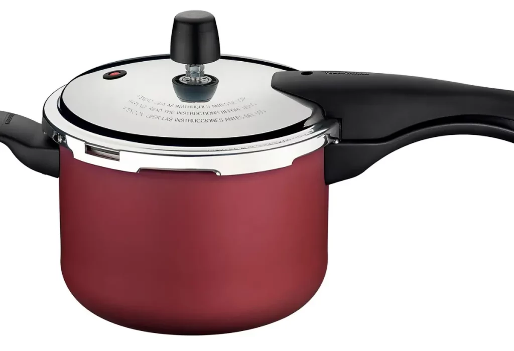 Uma Panela de Pressão Vancouver com revestimento vermelho.