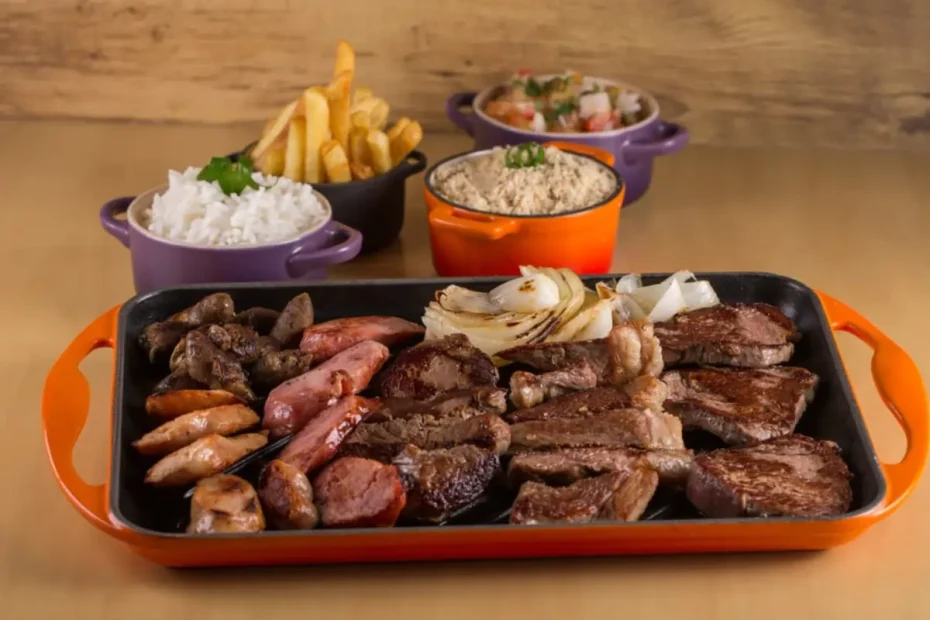 Uma mesa preparada com churrasco feito na panela de pressão.